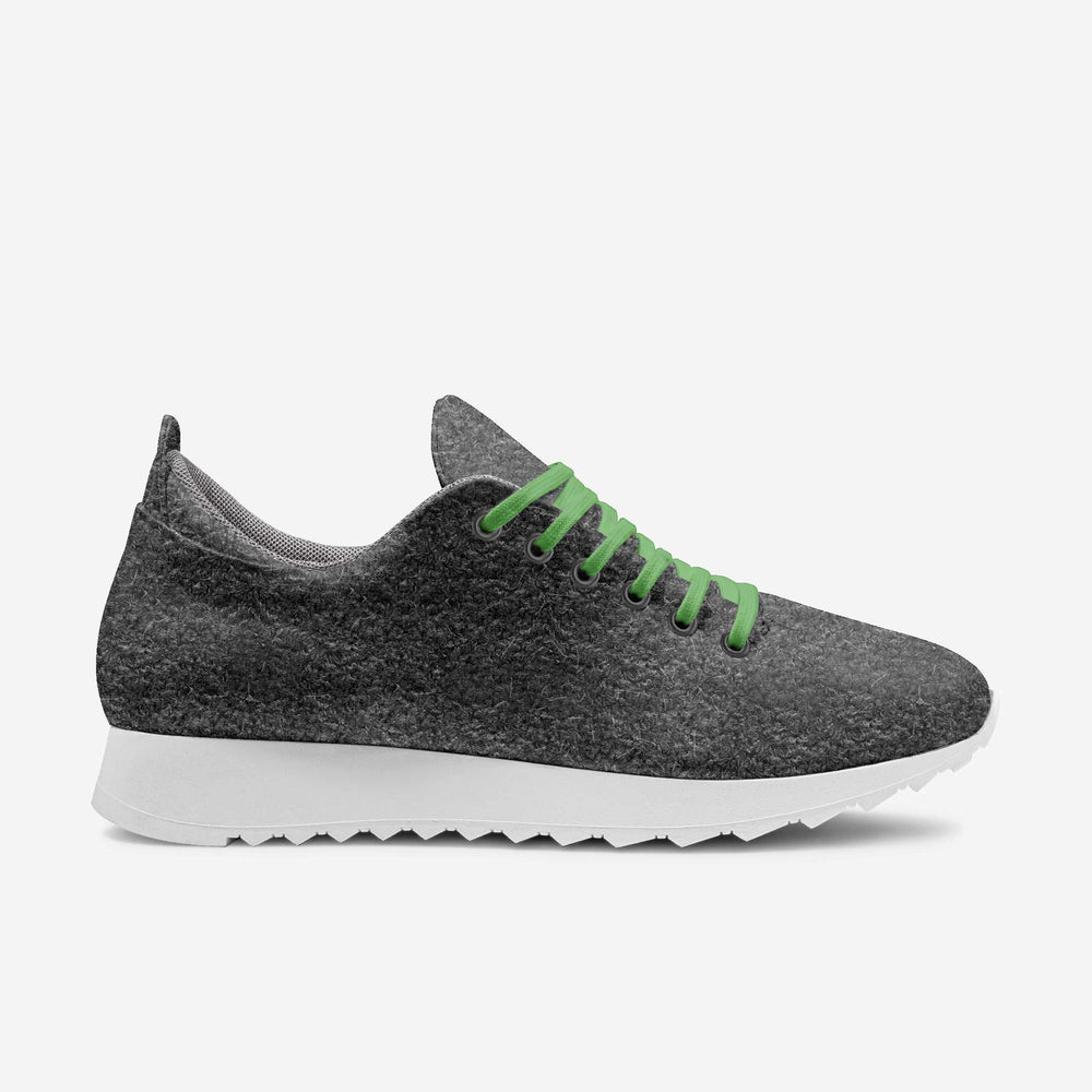 Eco-friendly, vegan 'Align' sneakers with a gray textured upper and green laces showcasing sustainable luxury.