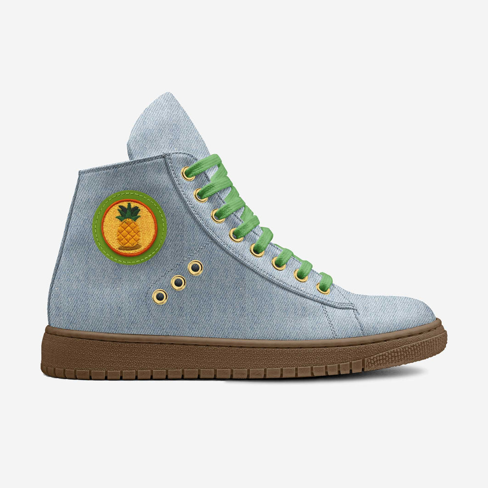 Sustainable 'Wave' high-top sneakers in denim fabric with a vibrant pineapple patch, featuring green laces and gold eyelets for eco-conscious style.