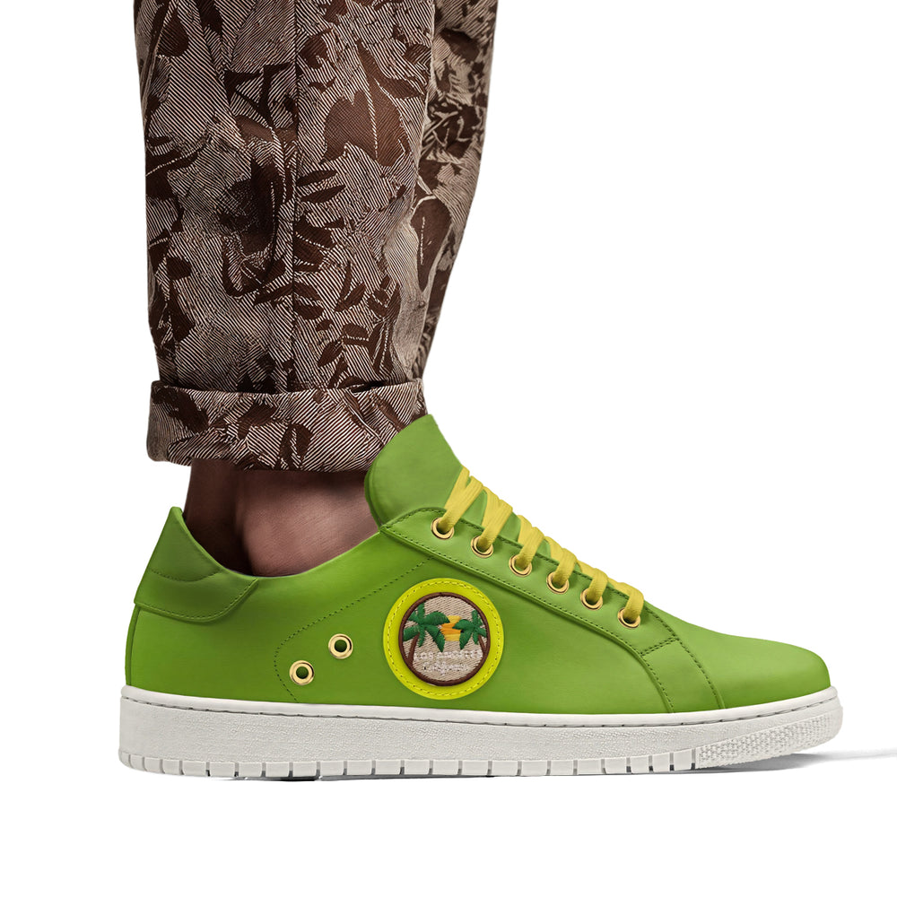 Sustainable 'Lumen' sneakers in vibrant green with yellow laces and a palm tree patch, crafted from vegan materials for eco-friendly fashion.